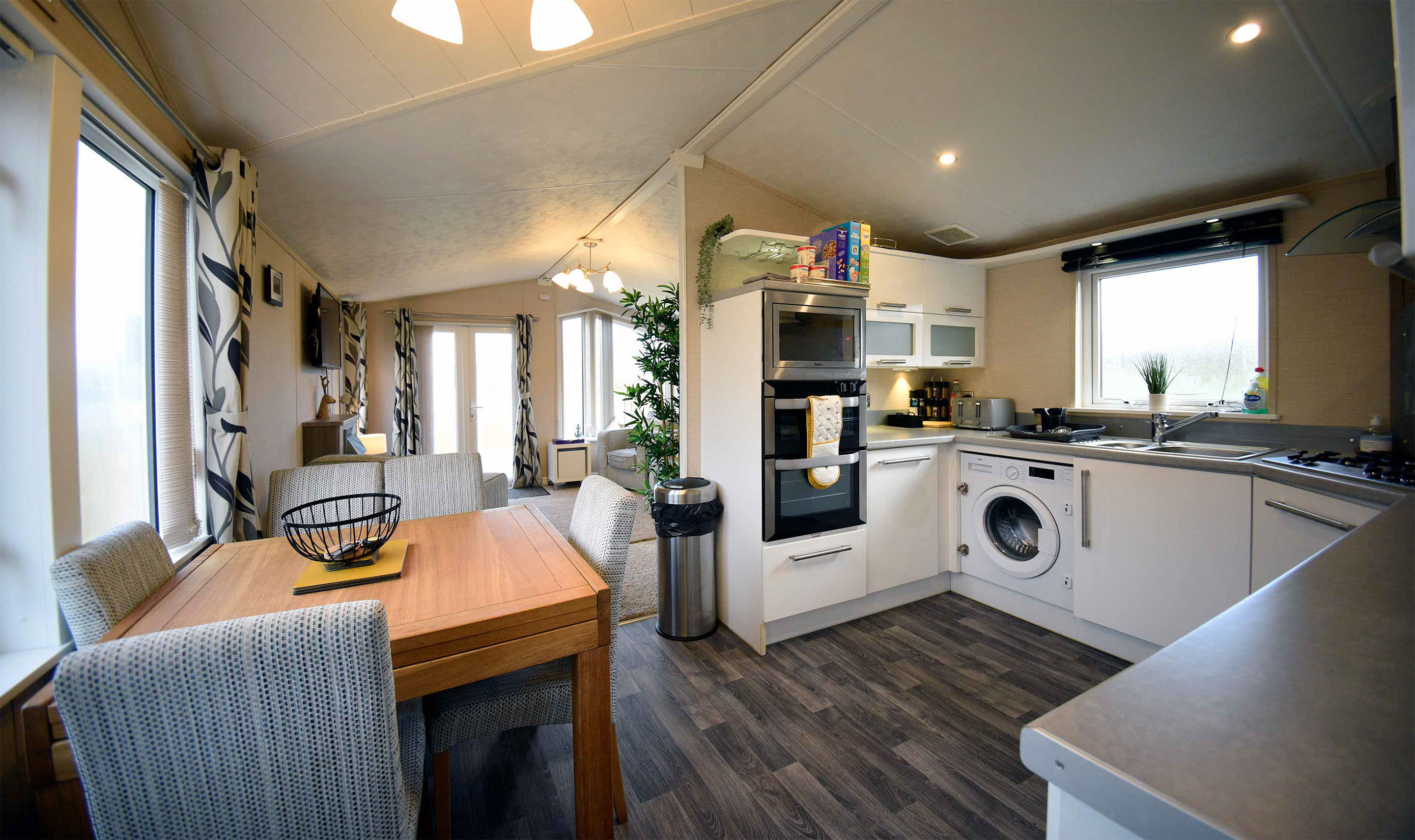 Our Marsco caravan contains luxury facilities such as a modern kitchen and comfortable living room with WIFI internet